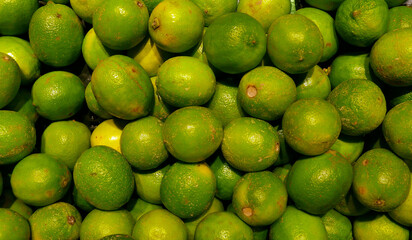 Closeup of lemons, green and delicious 