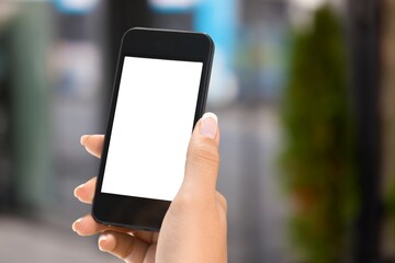 Human hands showing smartphone against background.