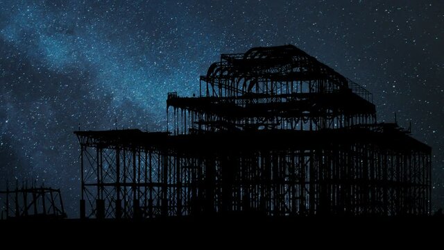 Ruins of West Pier in Brighton, Time Lapse by Night with Stars and Milky Way in Background, England, UK