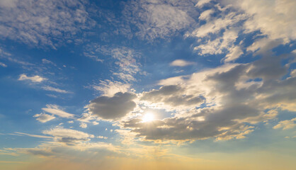 Fototapeta premium Sunset sky. Abstract nature background. Dramatic blue with orange colorful clouds in twilight time.