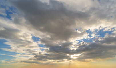 Obraz premium Sunset sky. Abstract nature background. Dramatic blue with orange colorful clouds in twilight time.