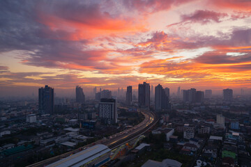 Fototapeta na wymiar Aerial view of highway street road at Bangkok Downtown Skyline, Thailand. Financial district and business centers in smart urban city in Asia.Skyscraper and high-rise buildings at sunset