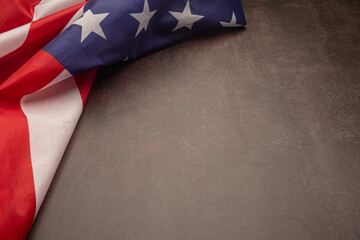 Fototapeta premium American flag on a vintage background with copy space