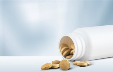 Concept of antiviral pill against coronavirus disease. COVID drugs on a medical table.