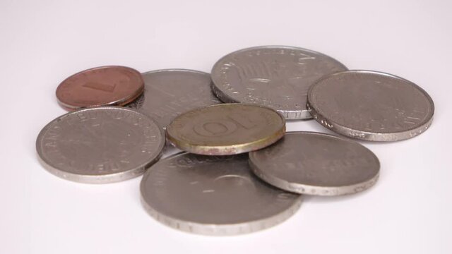 Several coins of the no longer current currency Deutsche Mark from Germany.