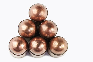 Set of 8 mm pistol cartridge with ball copper bullet isolated on a white background. Pistol ammunition.
