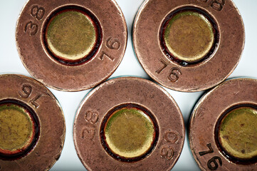 Set of 8 mm pistol centerfire cartridge. Primer, bullet cap. Pistol ammunition.