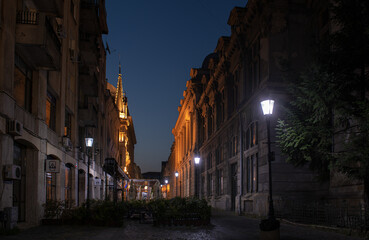 Landmarks of Bucharest. Historical buildings from the Old Town photographed during the night. Romania, 2021.