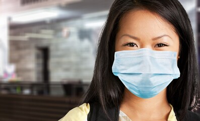 Omicron variant of COVID. Young woman checks coronavirus sars-cov-2 covid-19 global cases situation...