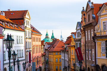 Fototapeta premium Prague colorful cityscape. Prague street top view. Vintage toned image.