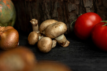 Champignon mushrooms with other ingrediants and vegetables in the kitchen
