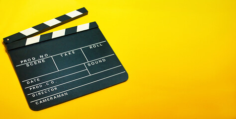 A clapperboard, symbol of filmmaking and video production. Professional type of equipment, used on...