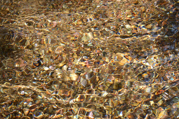 Water stream on colorful rocks