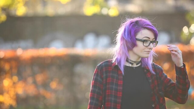 Portrait of alternative young woman in London at park