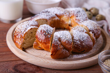Russian national bread Kalach on a wooden background
