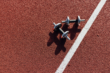 Top view of dumbbells that is on the ground