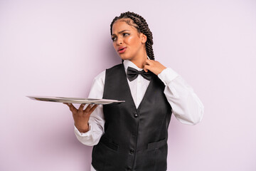 afro black woman feeling stressed, anxious, tired and frustrated. waiter with a tray