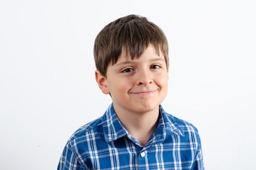 Cute smiling boy looking at front