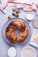Russian national bread Kalach on a gray background.