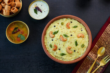 Ven Pongal Khara Pongal with Sambar coconut Chutney popular Indian breakfast food Tamil Nadu festival Pongal Sankranti Diwali spicy pongal prepared with rice lentil semolina rava South India Sri Lanka
