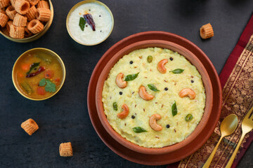 Ven Pongal Khara Pongal with Sambar coconut Chutney popular Indian breakfast food Tamil Nadu festival Pongal Sankranti Diwali spicy pongal prepared with rice lentil semolina rava South India Sri Lanka
