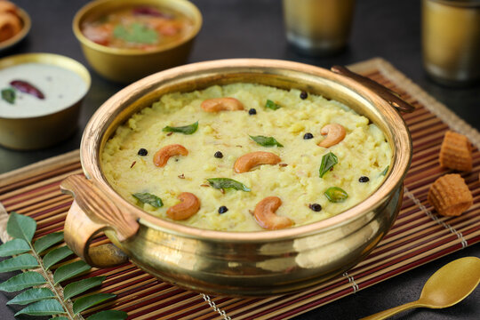 Ven Pongal Khara Pongal with Sambar coconut Chutney popular Indian breakfast food Tamil Nadu festival Pongal Sankranti Diwali spicy pongal prepared with rice lentil semolina rava South India Sri Lanka