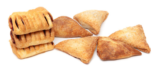 Puff pastries with jam isolated on a white background.