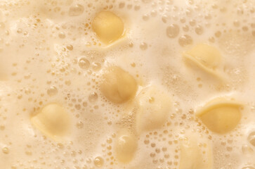Dumplings made from dough and meat are boiled in boiled water.