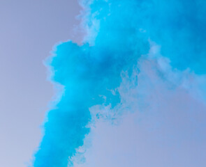 Fototapeta na wymiar Blue smoke on a blue background.