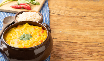 Vegan version of typical brazilian shrimp bobo with copy space. Cauliflower, bell pepper, tomato,...