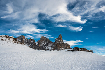 Fototapeta na wymiar Passo Rolle and the Pale di San Martino. Dolomites in winter.