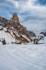 Fototapeta na wymiar Passo Rolle and the Pale di San Martino. Dolomites in winter.