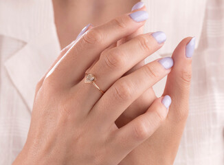 Obraz na płótnie Canvas Diamond jewelry. Diamond ring on woman hand