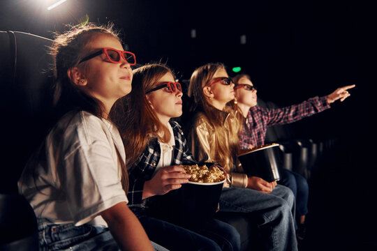 Interesting Movie. Group Of Kids Sitting In Cinema