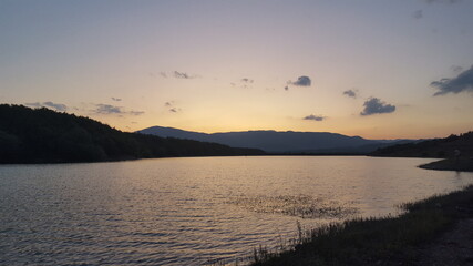 Fototapeta premium sunset over lake