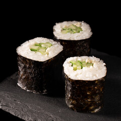 japanese sushi rolls with cucumber and rice