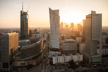 Fototapeta Nowoczesne wieżowce w Warszawie podczas zachodu słońca, Polska
 obraz