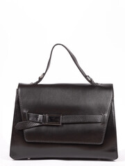 Small black leather woman's fashion handbag with strap isolated on white background