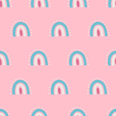 Seamless pattern with rainbows on light pink background. Vector illustration