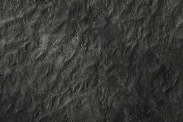 Dark grey black slate background or texture. Black granite slabs background. 