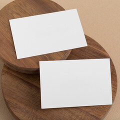 Two Business cards on a wood - closeup. Minimal mock up.
