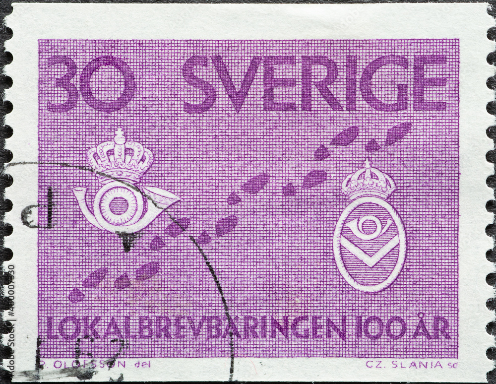 Wall mural sweden - circa 1962: a postage stamp from sweden showing post horn with crown and footprint. 100 yea