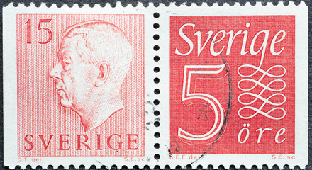 Sweden - circa 1957: a postage stamp from Sweden showing a portrait of King Gustaf VI Adolf and number 5 with decoration.