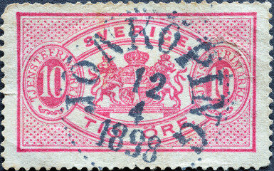 Sweden - circa 1885: a postage stamp from Sweden showing a Large Coat of Arms from Sweden with a...