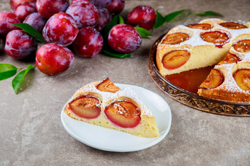 Piece of soft sponge cake with plum.