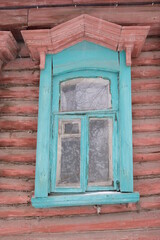 Old wooden houses in Ryazan. Beautiful platbands.