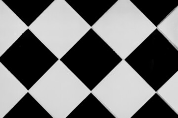 White and black mosaic ceramic tile abstract pattern interior surface floor texture background