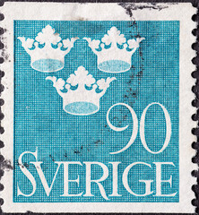 Sweden - circa 1939: a postage stamp from Sweden showing three crowns
