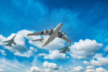 Fototapeta na wymiar Military jets flying in sky