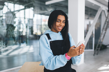 girl using mobile phone in office